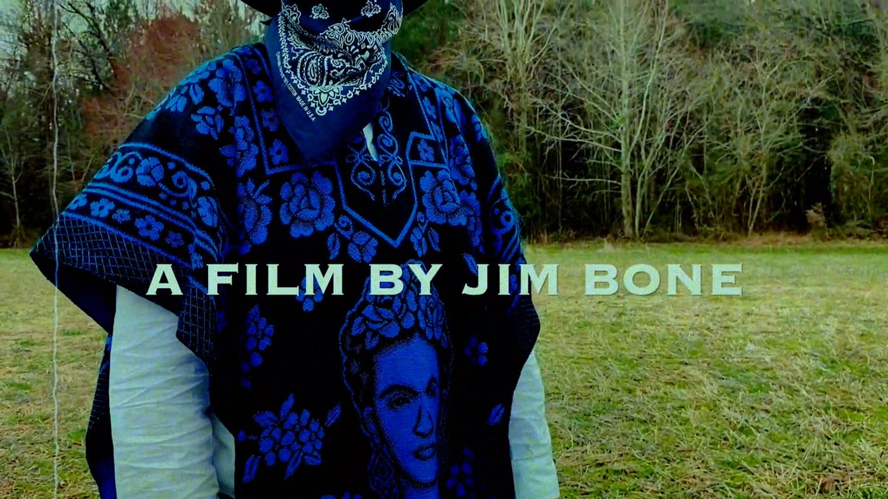 A masked cowboy in a blue poncho from Black Spurs